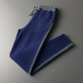 Men's navy blue cashmere wool blend half turtleneck zippered cardigan and matching trousers set.