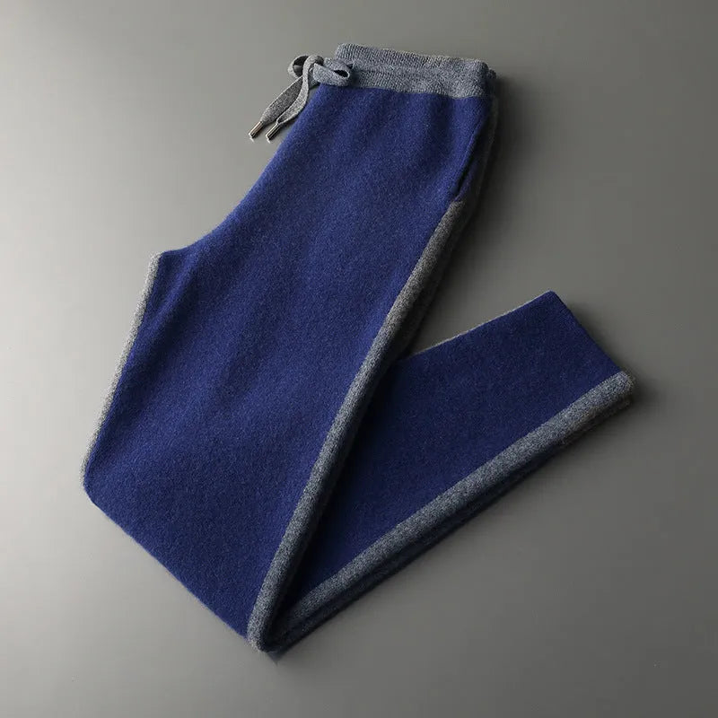 Men's navy blue cashmere wool blend half turtleneck zippered cardigan and matching trousers set.