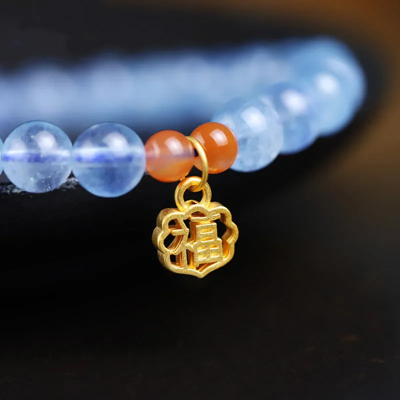 Women's ice translucent bracelet with 8mm crystal beads and a blessing card charm on a white background.