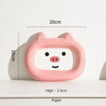 Ceramic pet bowl with a raised animal motif design on the side, shown in one of six available themes.