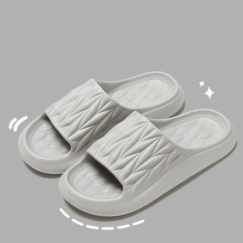 Leaf texture design EVA household slippers in various colours on a non-slip sole.