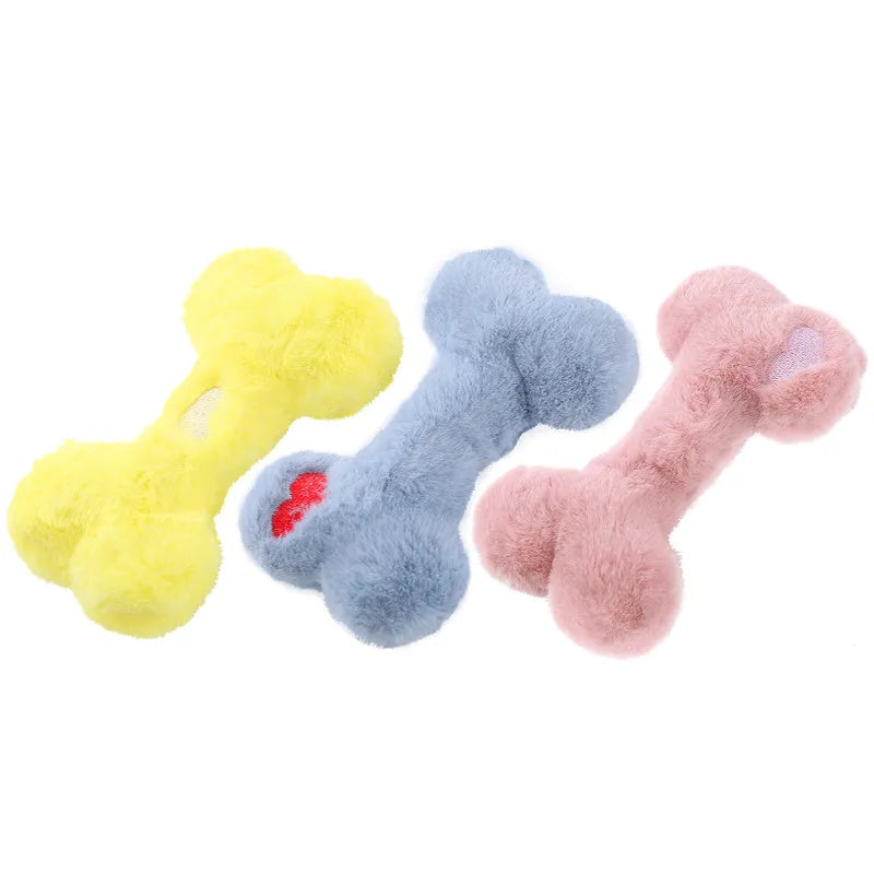 Blue love bone shaped plush dog toy with squeaker for interactive biting and chewing play