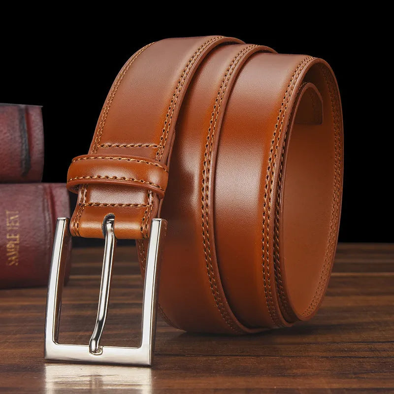 Men's black genuine leather belt with an alloy pin buckle, shown with a length measurement chart.