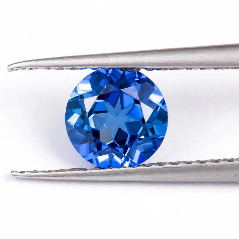 Royal blue heart-shaped tiara cut cubic zirconia loose gemstone on white background