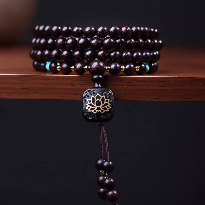 Zambia rosewood bead bracelet with 108 beads in flat lotus pendant design and grinding finish