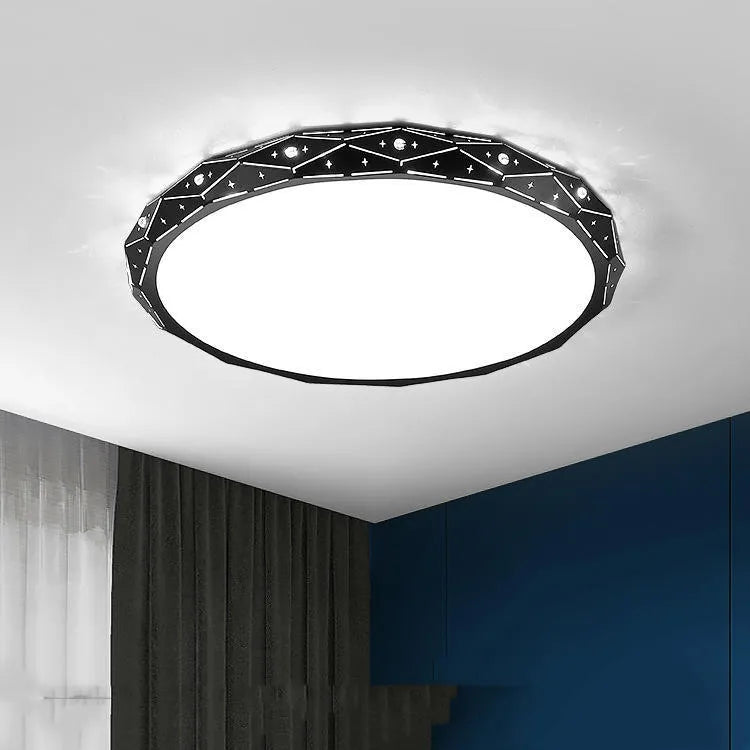 Round black iron frame LED ceiling light on a white ceiling.