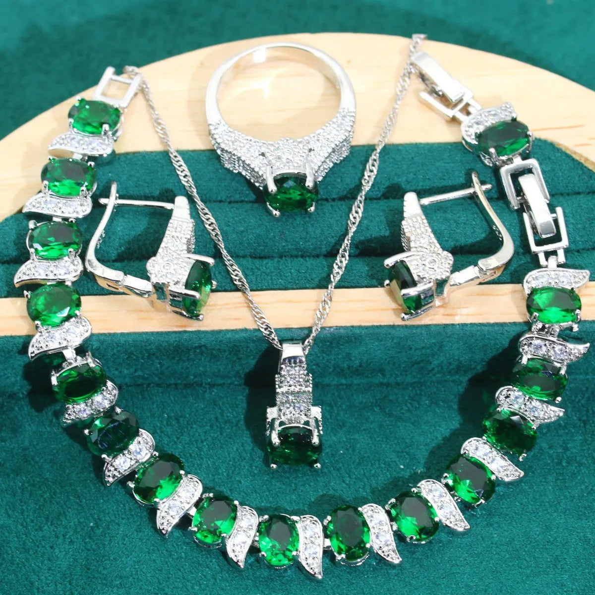 Bridal zircon jewellery four-piece set showing necklace, bracelet, earrings and ring in alloy with water wave chain