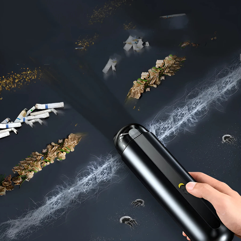 Compact handheld wireless car vacuum cleaner in black, white, or green, showing suction nozzle and blowing hose.