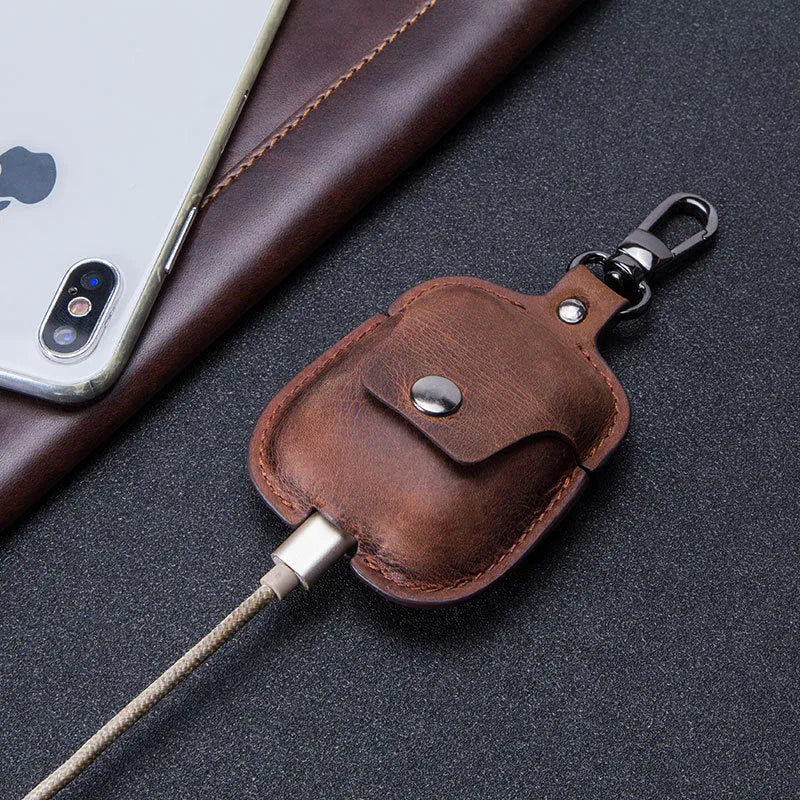 Crazy horse cowhide leather AirPods cover with keychain and charging hole, 6.8cm x 12.3cm, in blue, brown, coffee, or red.