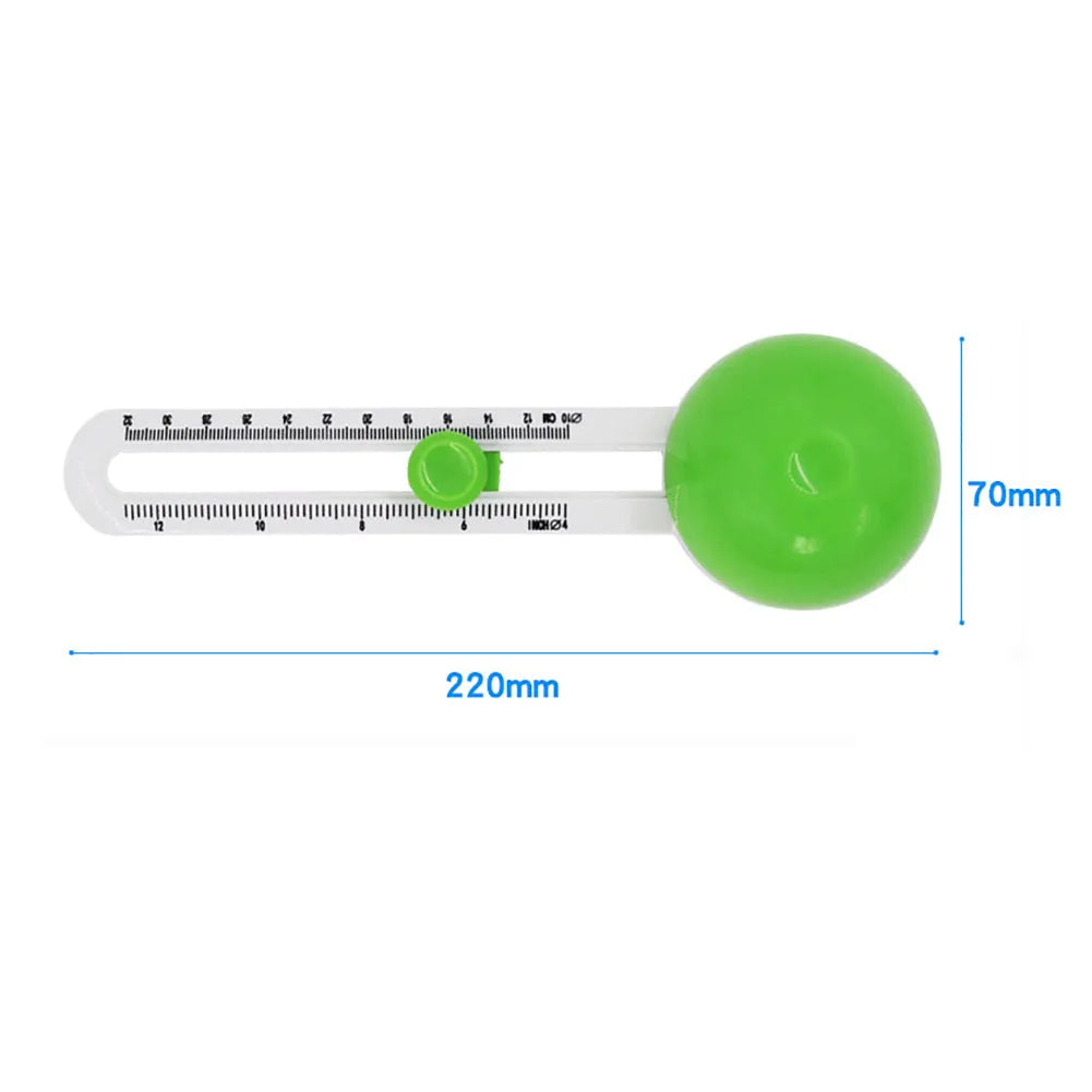 Green or orange plastic round paper cutter for A3 paper on a colour box.