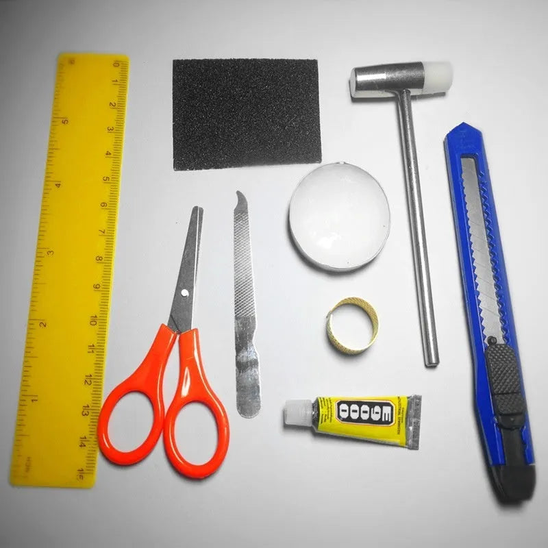 Manual assembly model tool set including scissors, tweezers, ruler, art knife, and glue for craft building
