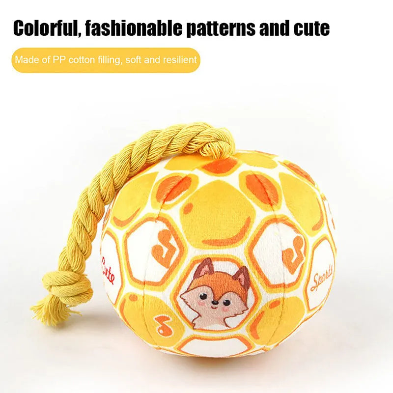 Blue and yellow elastic football dog toy with cotton rope for tug-of-war and chewing.