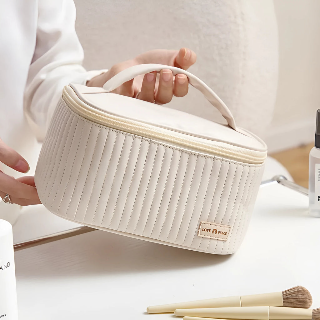 Open-top cake-shaped makeup bag in PU leather showing six colour options