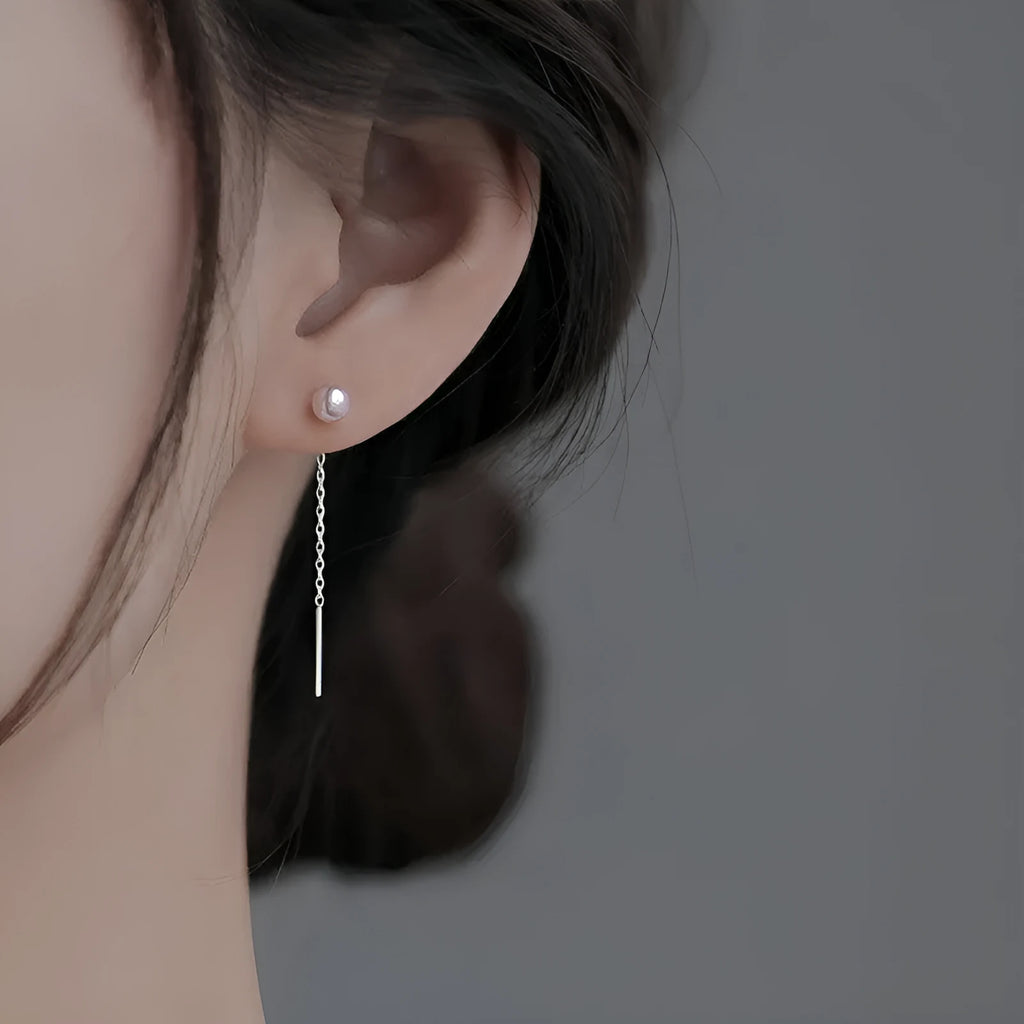 Sterling silver ear string earring with a selection of 5mm pendant charms including pearl, clay ball, and geometric shapes.