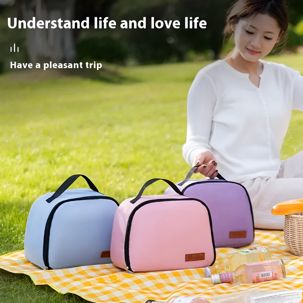 Insulated lunch box bag in textured cloth material showing colour options