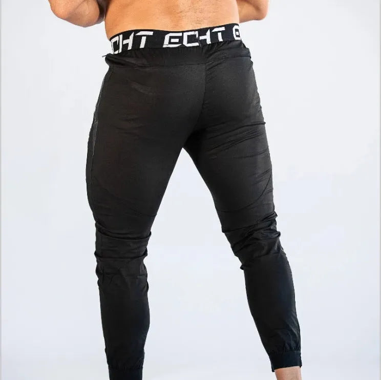 Cotton fitness sweatpants for men, black, with elastic waist, suitable for running and gym