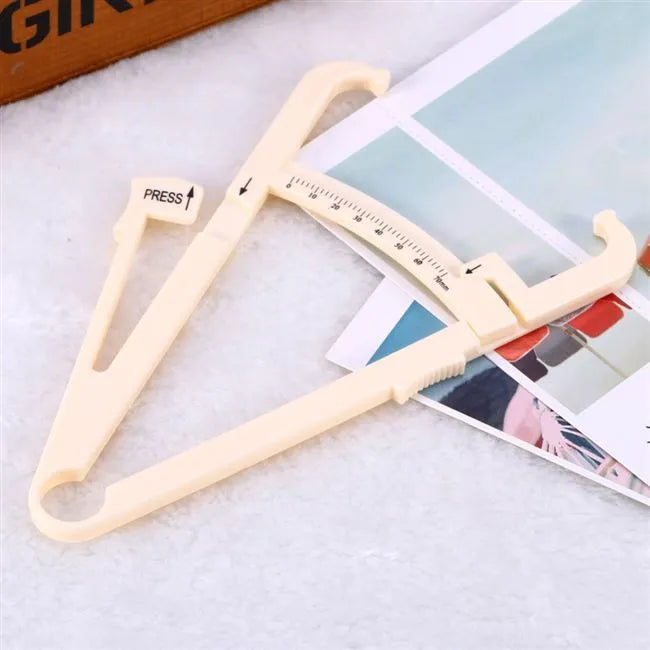 Compact acrylic body fat caliper showing measurement scale up to 200mm on a white background.