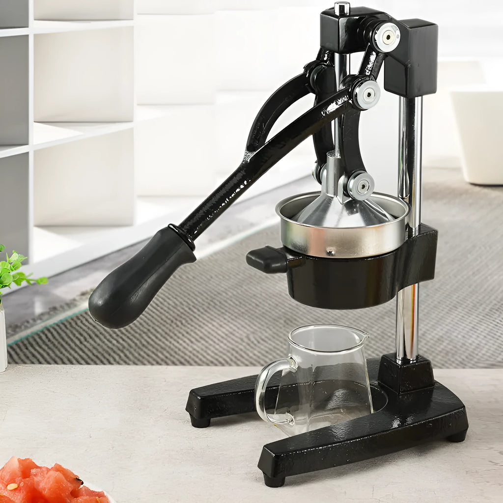 Black and white cast iron manual citrus juicer with stainless steel strainer, 40cm tall