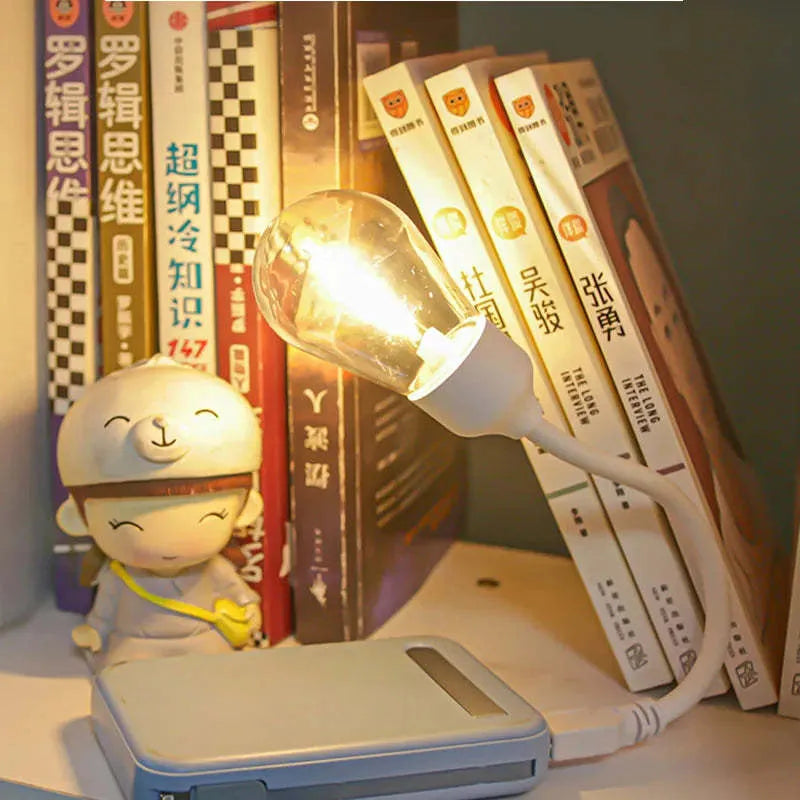 USB rechargeable folding night light with tungsten S14 bulb in warm white colour