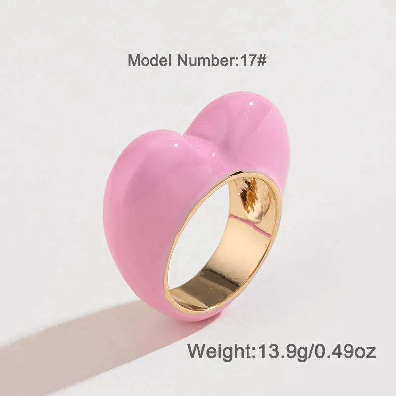 Heart-shaped zinc alloy ring with raised three-dimensional enamel colour design in love theme.