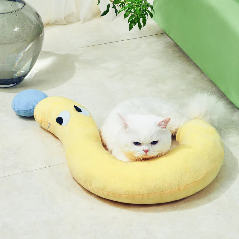 Blue or yellow pet sleeping cushion measuring 62 by 39 centimetres for cats and dogs