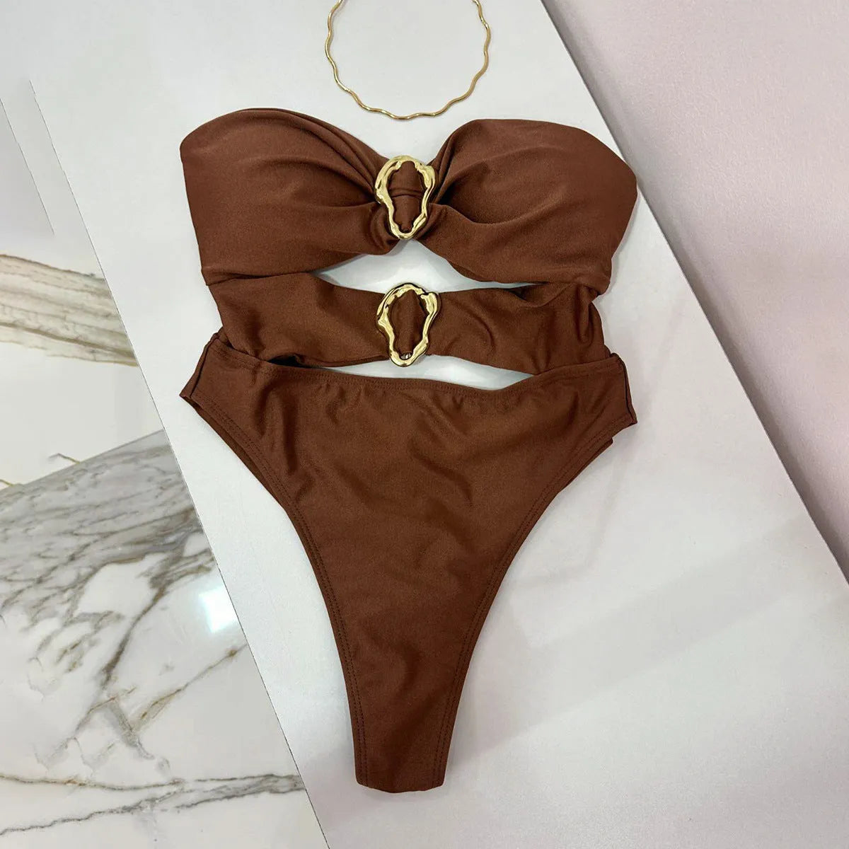Nylon one-piece solid colour swimsuit for women in black, brown, or red sizes S M L for swimming and wading