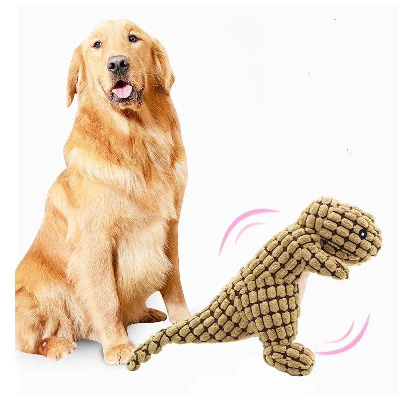 Grey, green, and orange durable rubber dog toy with sound feature for chewing and training.