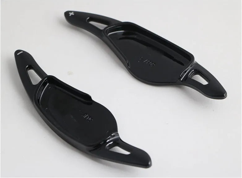 Carbon fibre pattern ABS plastic steering wheel shift paddle replacement for car interior modification.