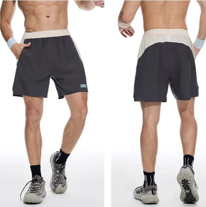 Man's loose grey workout shorts with elastic waist and lace-up fly for gym training