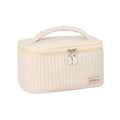 Open-top cake-shaped makeup bag in PU leather showing six colour options