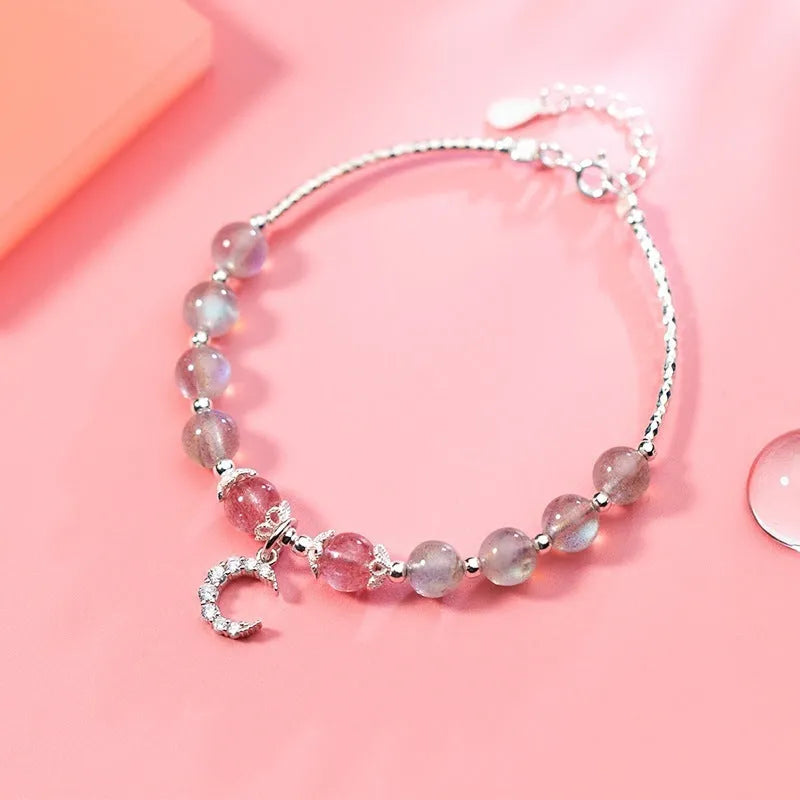 Natural moonstone handmade bracelet with crescent moon and crystal charms on adjustable chain