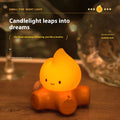 Cartoon silicone small fire pile night lamp showing yellow light illumination with ABS shade