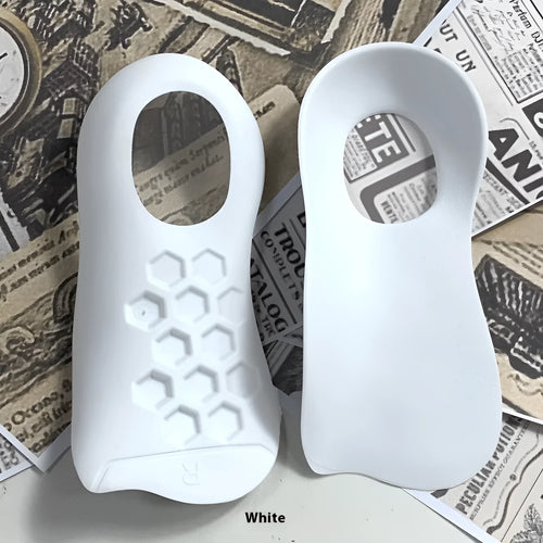 Pair of white TPR arch support insoles for varus correction, showing raised medial arch design.