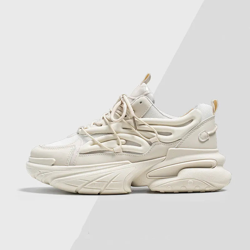 Men's beige and black sneakers with mesh upper, lace-up front, and rubber sole