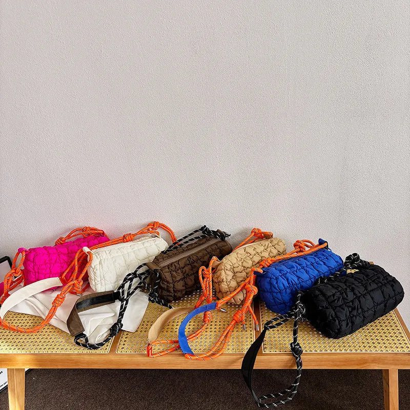 Women's lightweight nylon messenger bag in pillow shape with rhombus detailing and single shoulder strap