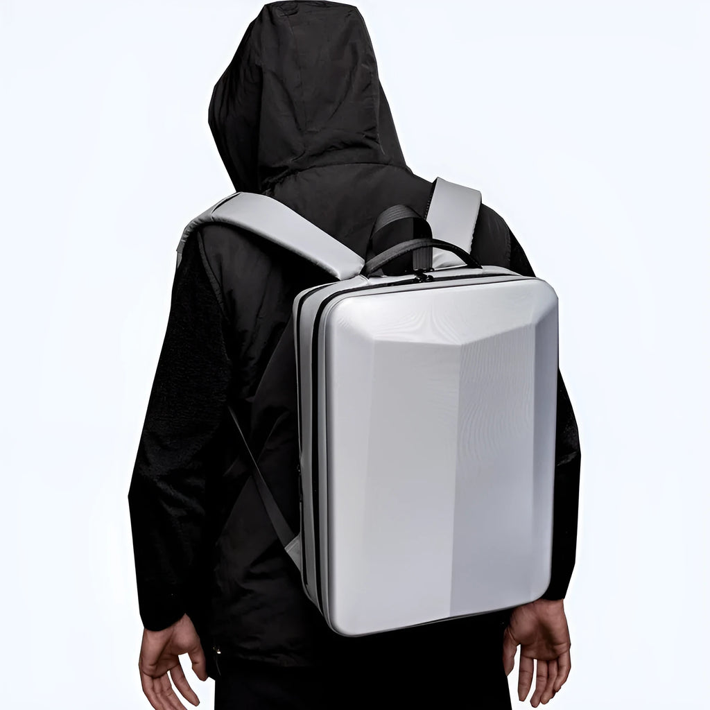 Men's black and silver white waterproof business backpack in street trend style with curved shoulder straps.