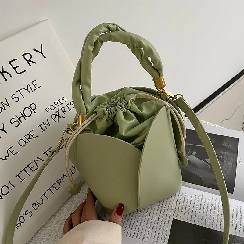 Women's small PU retro bucket bag in apricot with single shoulder strap and soft handle