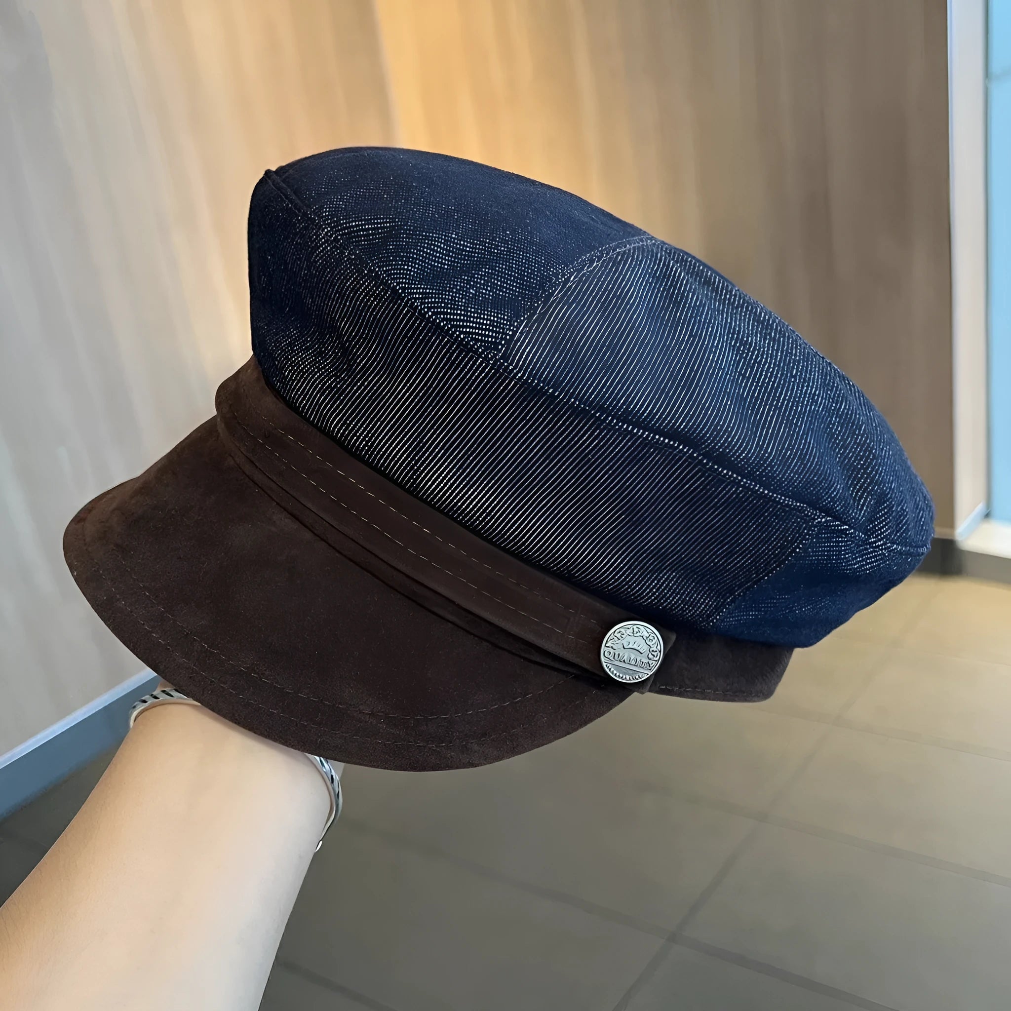 Dark blue denim octagonal newsboy hat with adjustable sizing for 54-58cm head circumference