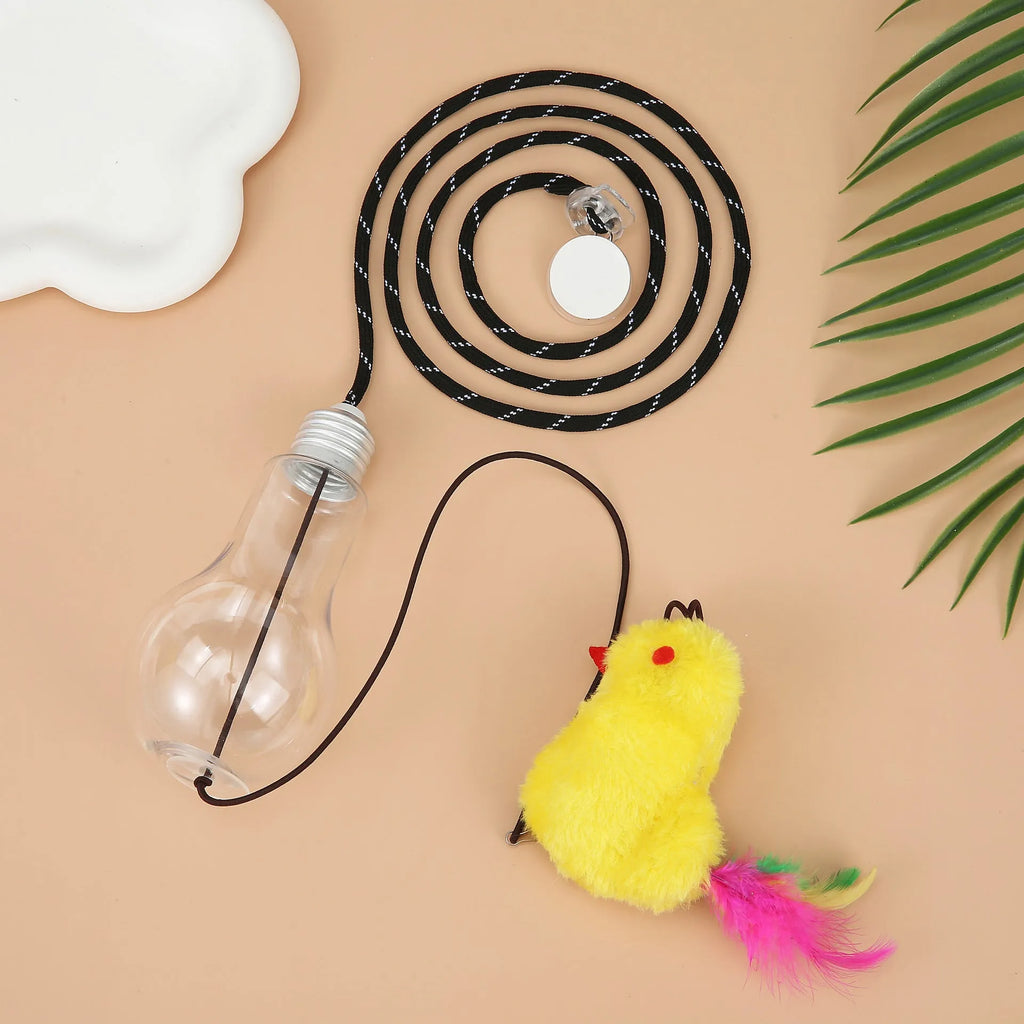 Interactive cat toy with swinging motion hanging from door frame featuring treat reward bulb and retractable elastic cord
