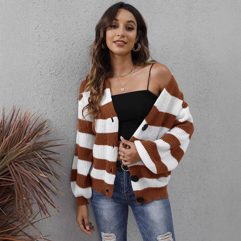 Blue and black striped women's cardigan sweater with button front and regular sleeves.