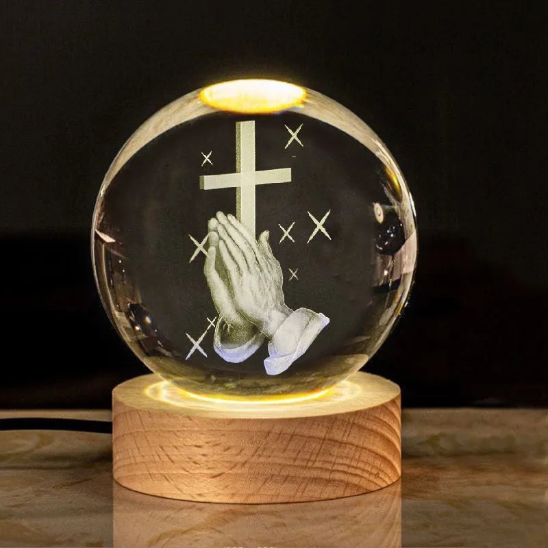 6cm white crystal religious ornament on wooden base with warm lighting