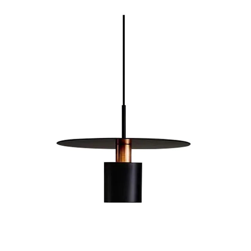 Modern minimalist black droplight pendant 20cm diameter on ceiling over a bedside table