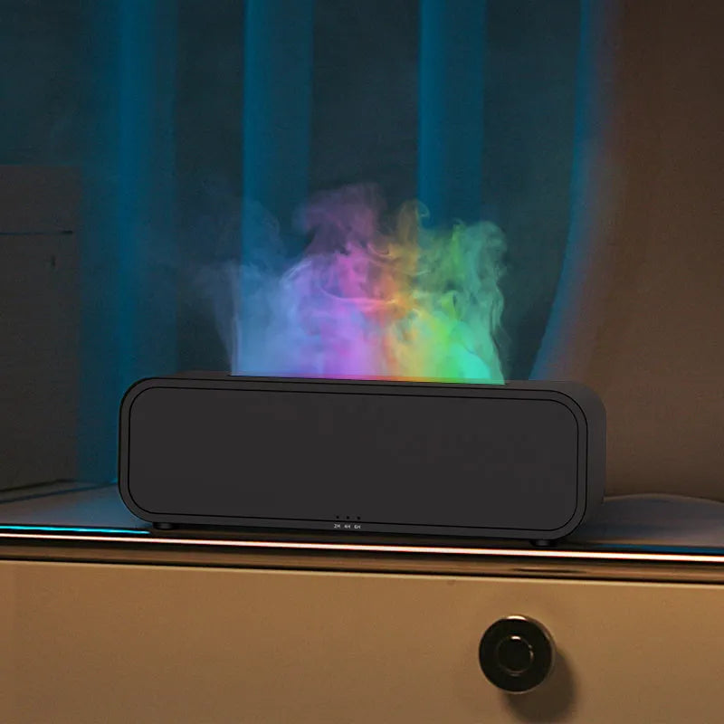 Black and white essential oil diffuser showing flame effect and colour-changing lights with remote control.