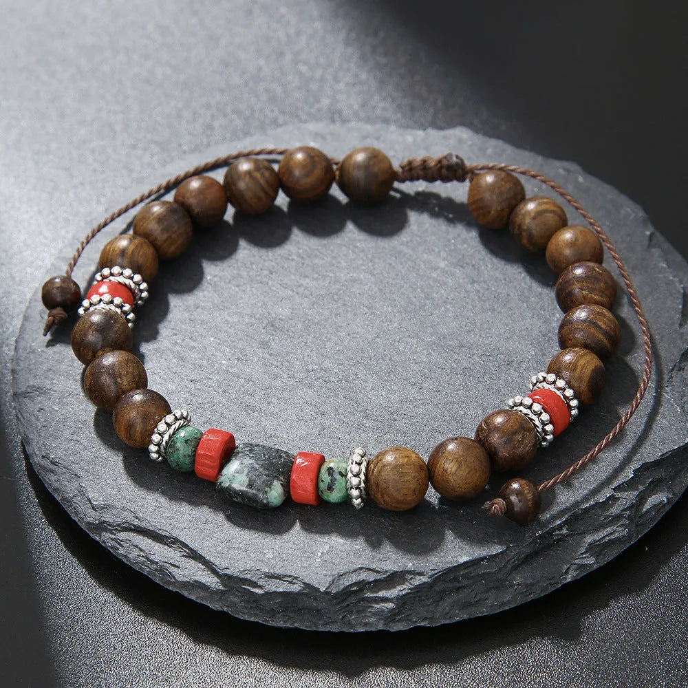 Hand-woven unisex wood bracelet with turquoise accents and totem pattern