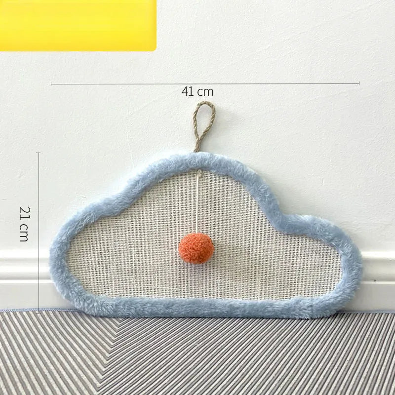 White wall-mounted cat scratching mat with natural sisal surface in a sleeping cat cartoon design.