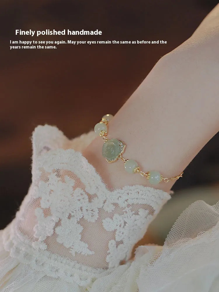 Original design women's bracelet in Hetian Jade Rose with 14K gold plating and a flower shape.