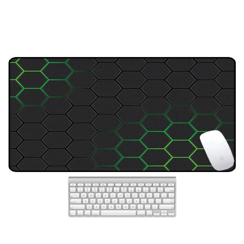 Large patterned desk mat for mouse and keyboard on a wooden desk.
