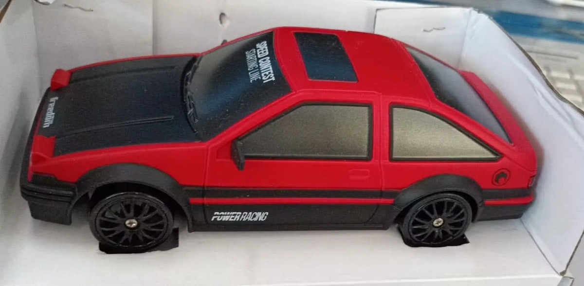 1:24 scale RC drift car with 4WD, 2.4GHz remote, GTR AE86 body, 4 racing tyres and 6 traffic cones