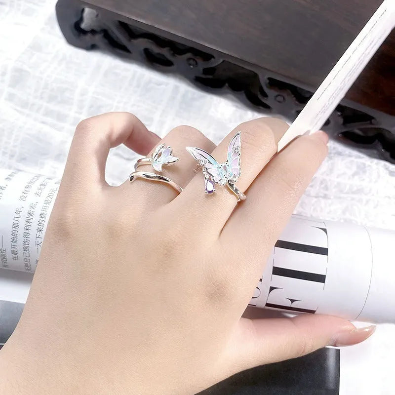 Adjustable copper insect fashion ring with an oil-drip textured finish.