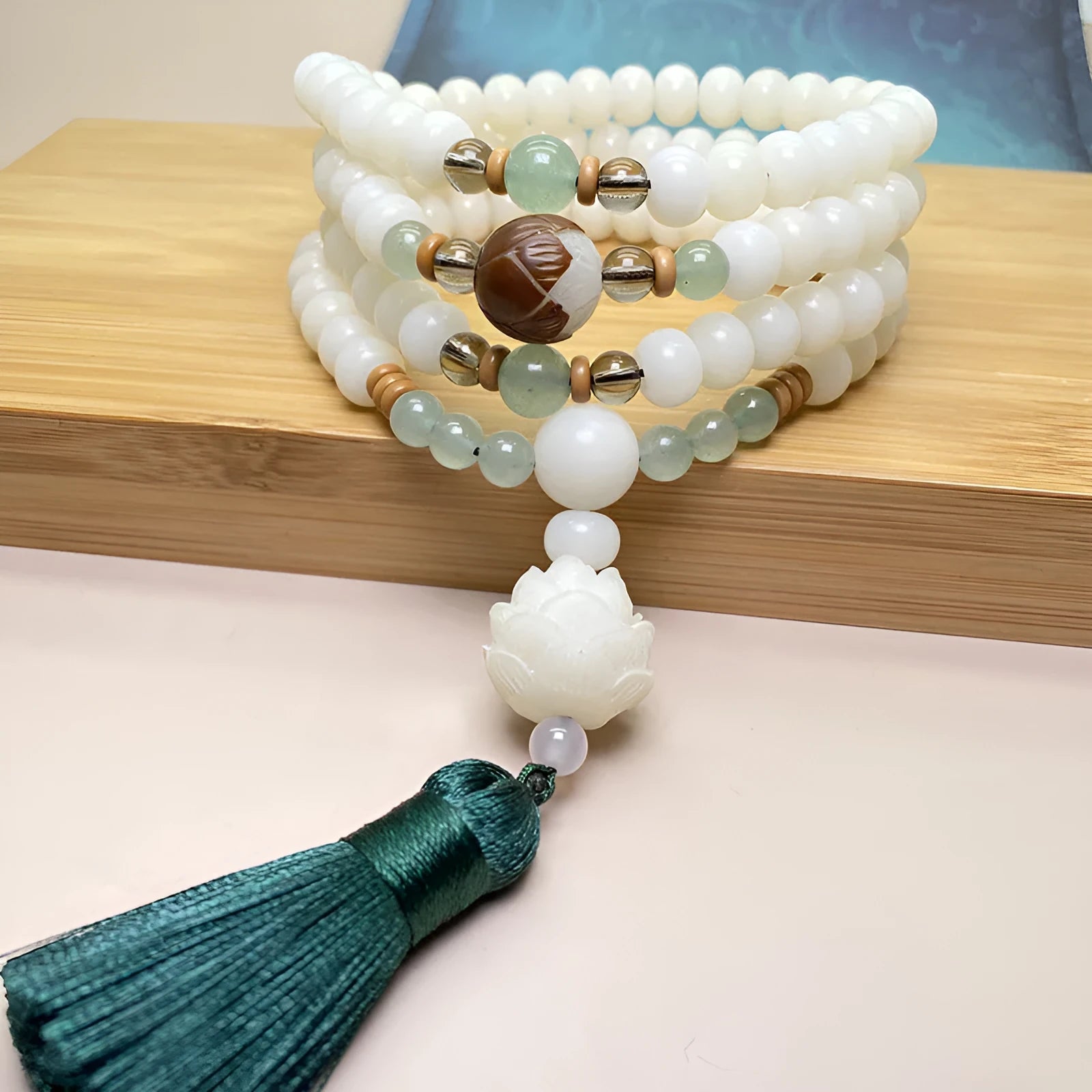 White Jade Bodhi 108-bead mala bracelet shown in three different style variations.